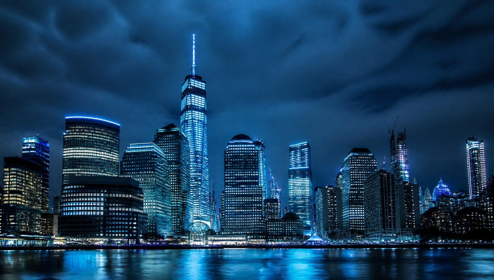 American financial district skyline illuminated at blue hour